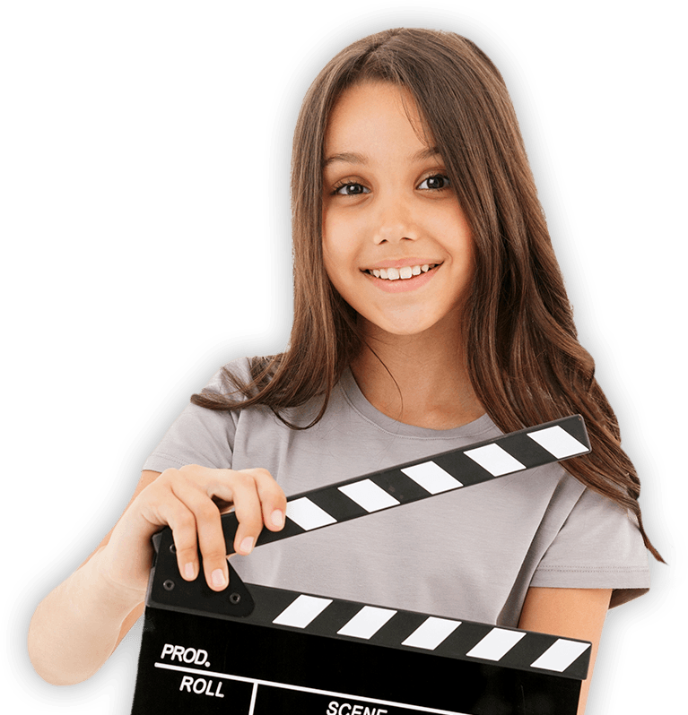 Child holding movie clap board