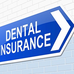 Blue and white sign that says “dental insurance”