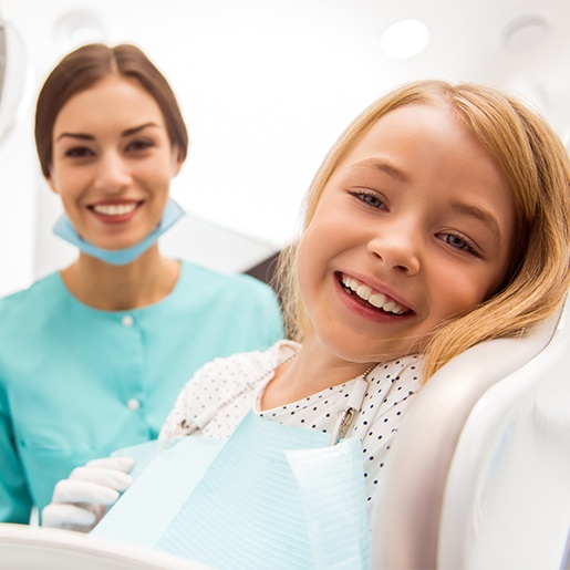 Laughing child in dental chair